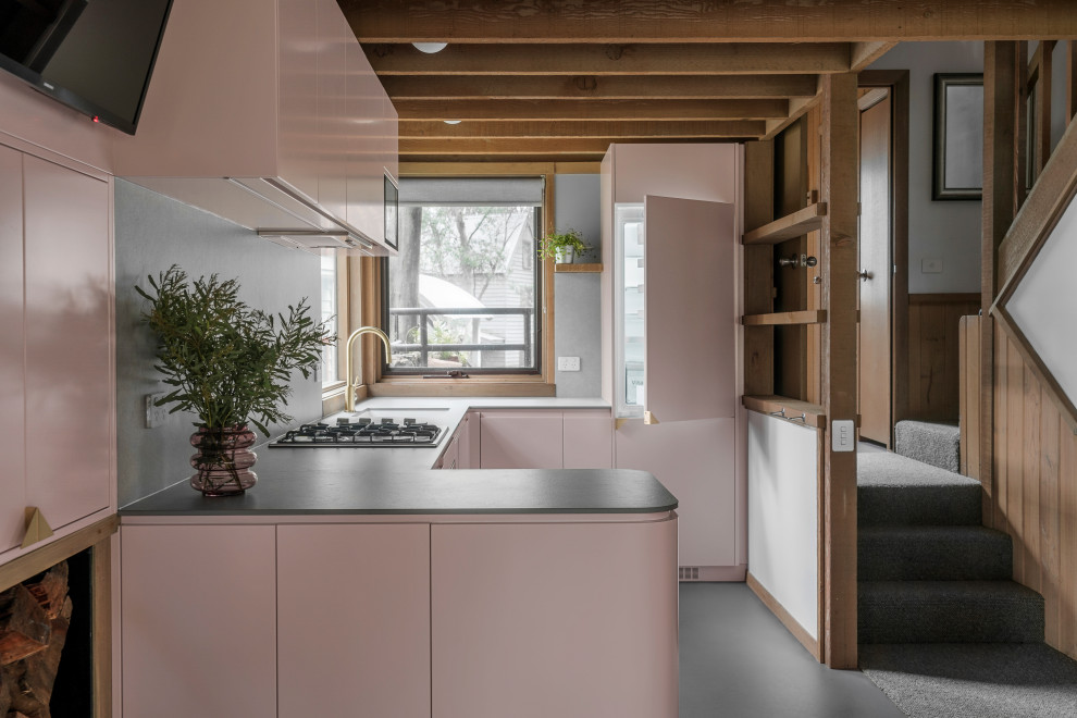 Design ideas for a small rustic l-shaped kitchen pantry in Other with a submerged sink, pink cabinets, composite countertops, grey splashback, porcelain splashback, coloured appliances, lino flooring, a breakfast bar, purple floors and grey worktops.