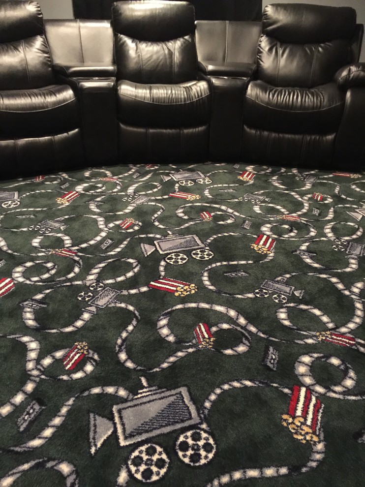 Photo of a mid-sized traditional enclosed home theatre in Jacksonville with carpet and multi-coloured floor.