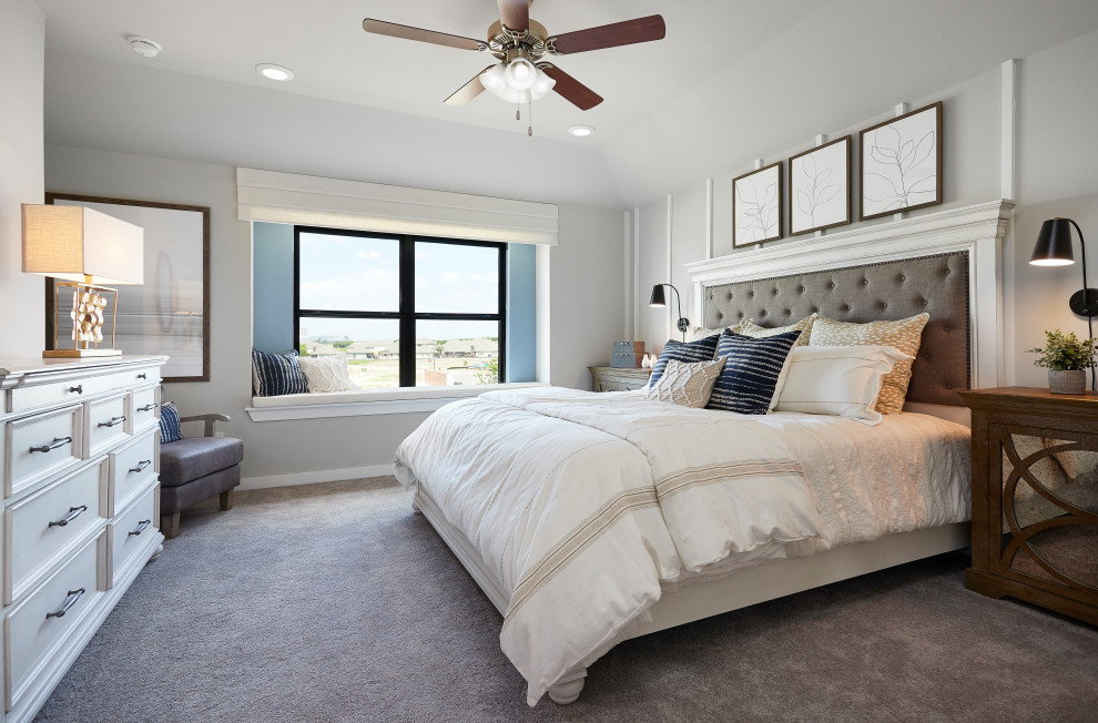 Photo of a mid-sized transitional master bedroom in Austin with white walls, carpet and grey floor.
