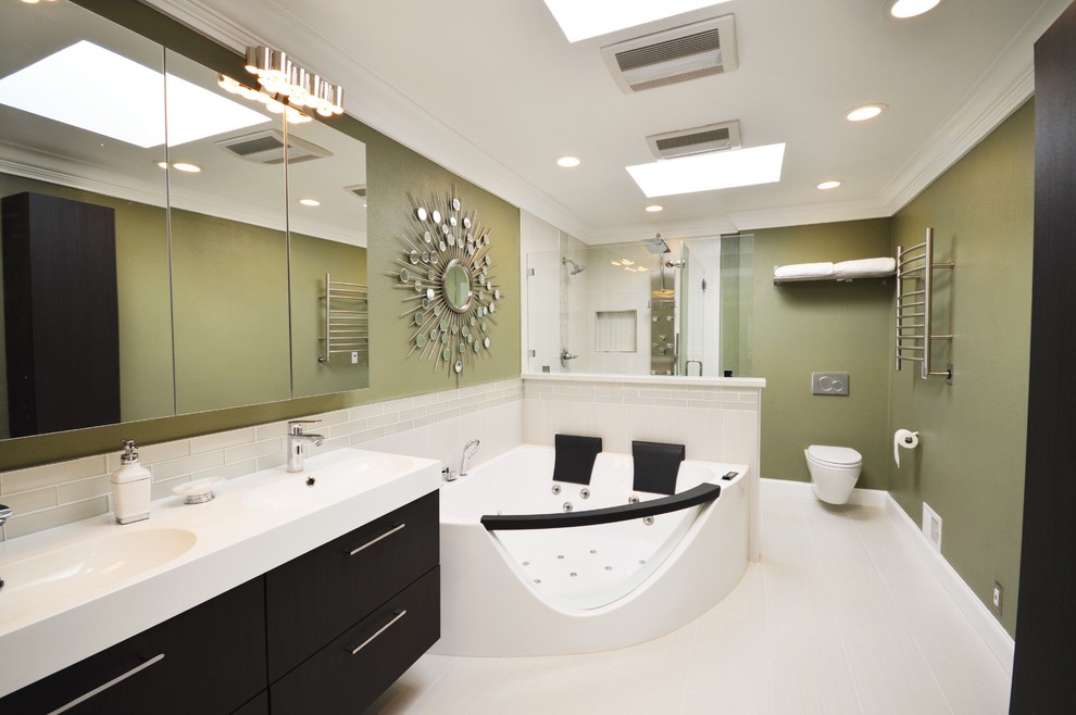 Large modern master bathroom in San Francisco with a wall-mount sink, flat-panel cabinets, dark wood cabinets, engineered quartz benchtops, a hot tub, a double shower, a wall-mount toilet, beige tile, porcelain tile, green walls and ceramic floors.