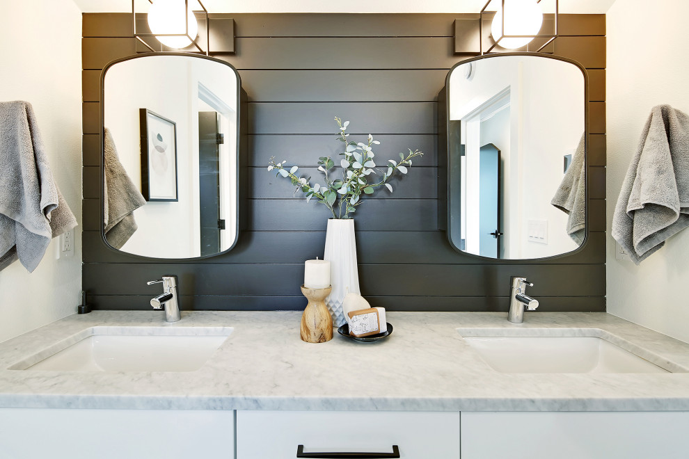 Mid-sized contemporary master bathroom in Seattle with recessed-panel cabinets, white cabinets, a drop-in tub, a shower/bathtub combo, white tile, ceramic tile, white walls, ceramic floors, marble benchtops, white floor, an open shower, grey benchtops, a double vanity and a built-in vanity.