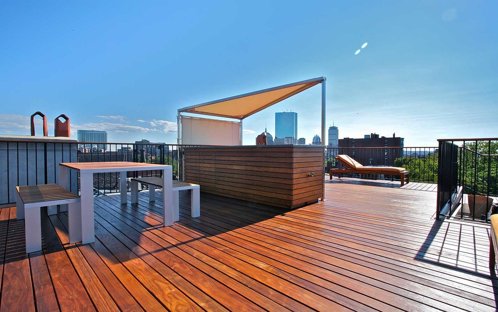 Inspiration for a large contemporary rooftop deck in Boston with an outdoor kitchen and a pergola.