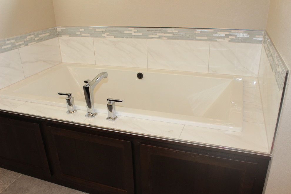 Inspiration for a large transitional master gray tile, white tile and matchstick tile porcelain tile bathroom remodel with shaker cabinets, dark wood cabinets, beige walls, an undermount sink and quartz countertops