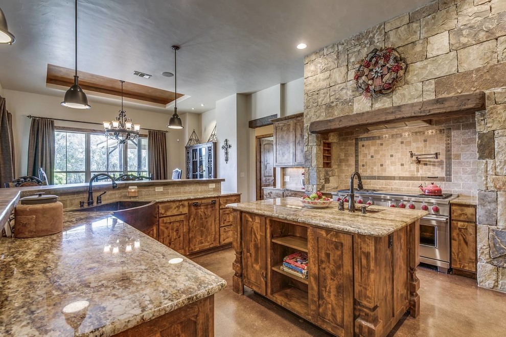 Mid-sized mountain style l-shaped concrete floor and brown floor open concept kitchen photo in Austin with a farmhouse sink, shaker cabinets, dark wood cabinets, granite countertops, gray backsplash, ceramic backsplash, stainless steel appliances, two islands and brown countertops