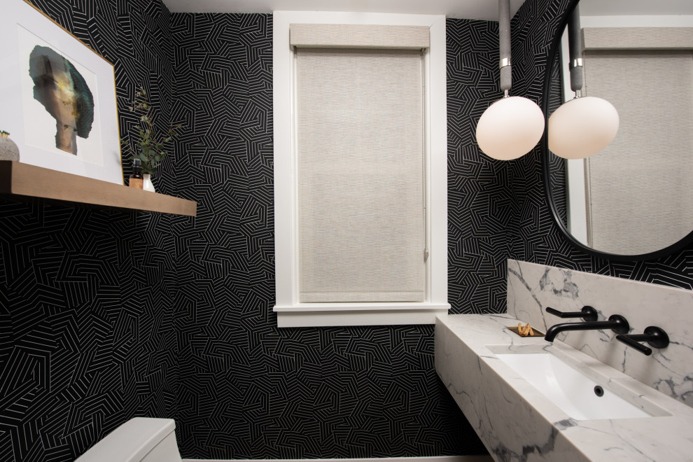 Photo of a small classic cloakroom in Chicago with open cabinets, white cabinets, a one-piece toilet, black walls, a built-in sink, engineered stone worktops, white worktops, a floating vanity unit and wallpapered walls.