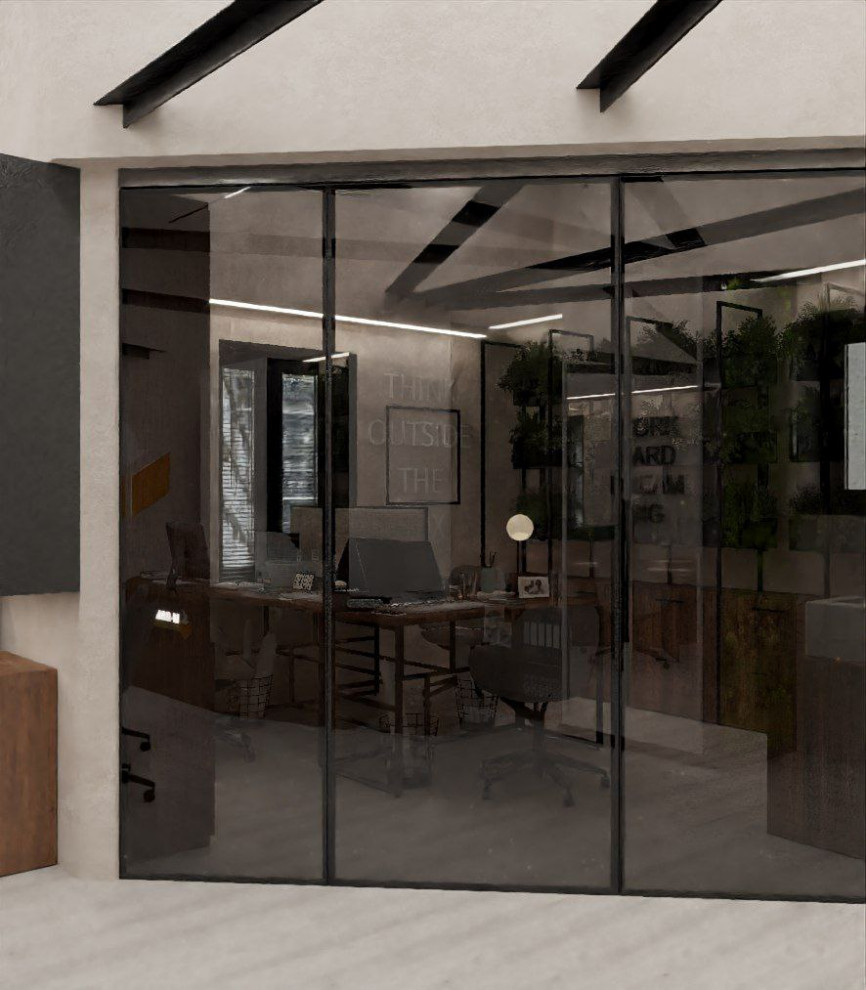 Foto di una stanza da lavoro design di medie dimensioni con pareti beige, pavimento in laminato e scrivania autoportante