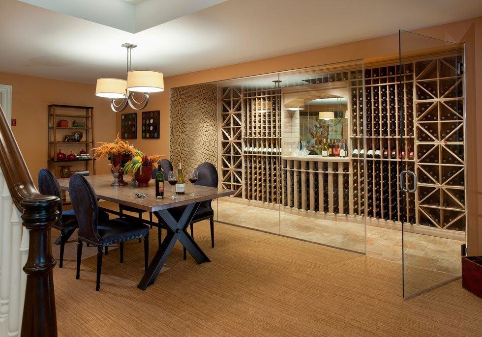 Photo of a large transitional wine cellar in Philadelphia with travertine floors, diamond bins and beige floor.