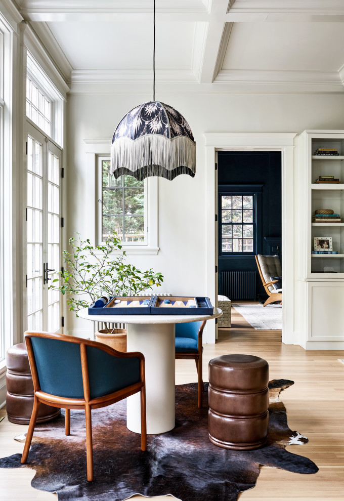 Example of a large transitional coffered ceiling family room design in DC Metro with a media wall