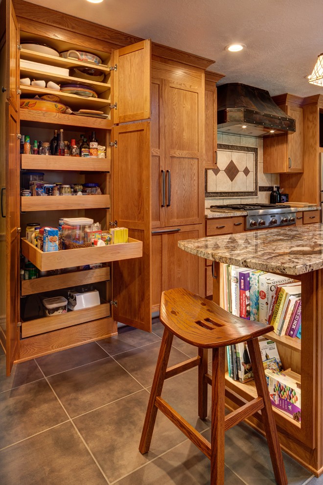 Example of a mountain style kitchen design in Denver