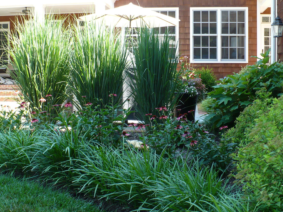 Design ideas for a small traditional backyard partial sun garden for summer in Baltimore.