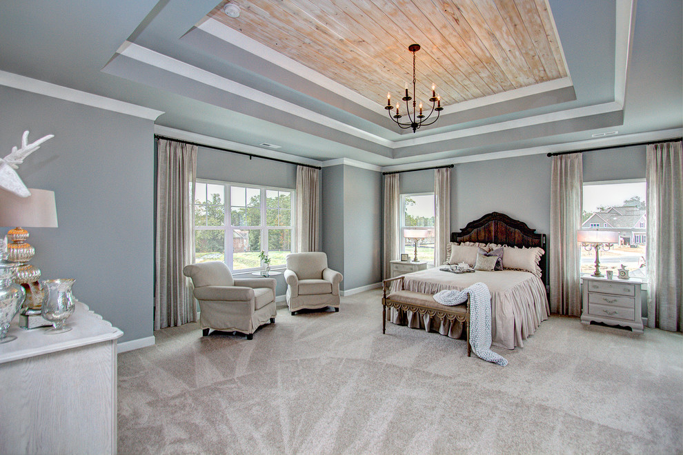 Photo of an expansive country master bedroom in Charlotte.