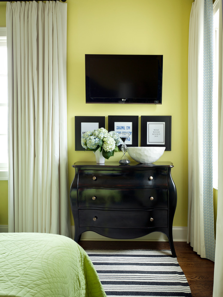 Photo of a mid-sized traditional kids' room for girls in Little Rock with green walls and dark hardwood floors.