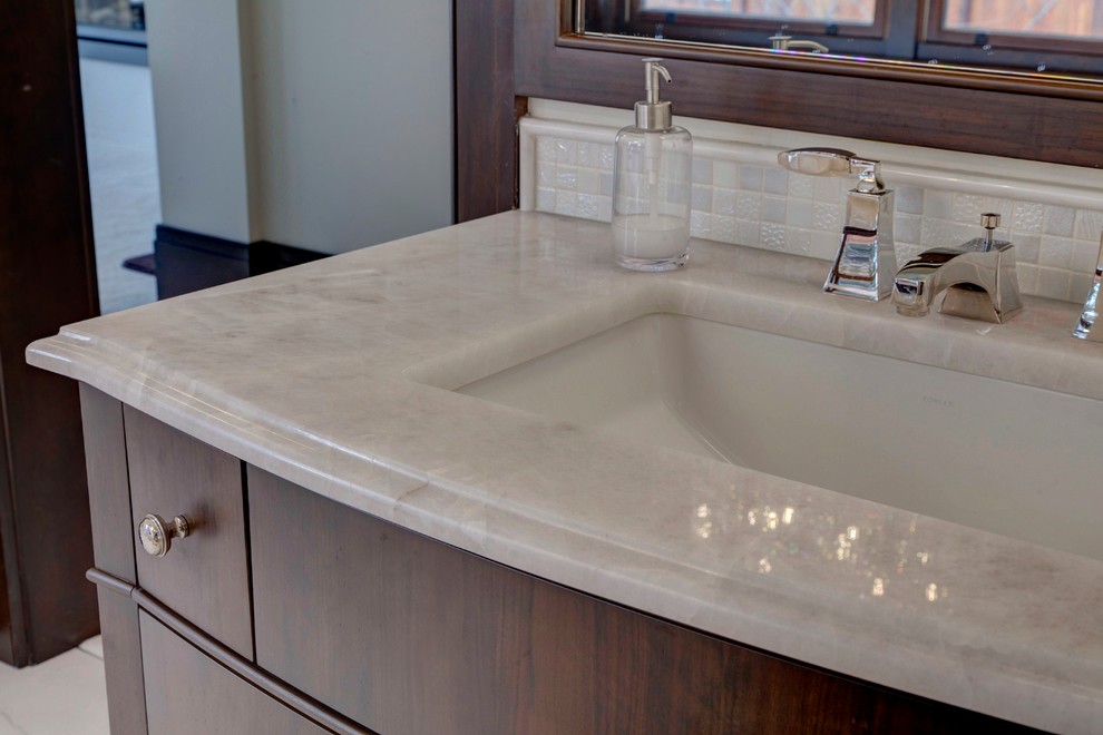 Example of a transitional bathroom design in Calgary
