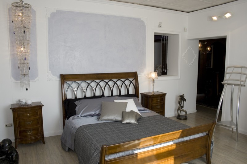 This is an example of an eclectic bedroom in Venice.