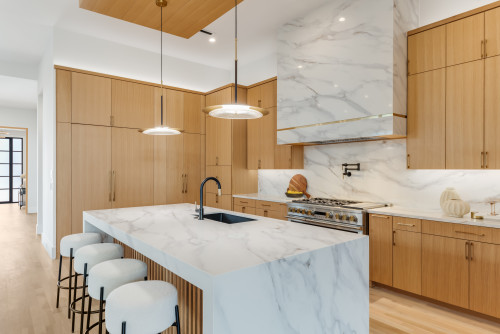 Fast delivery RTA cabinets in Canada with modern wood finish and marble island kitchen
