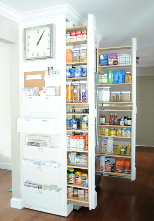 Full-height pull-out pantry columns with adjustable trays and door organizers—vertical storage solution for small condo kitchen cabinets