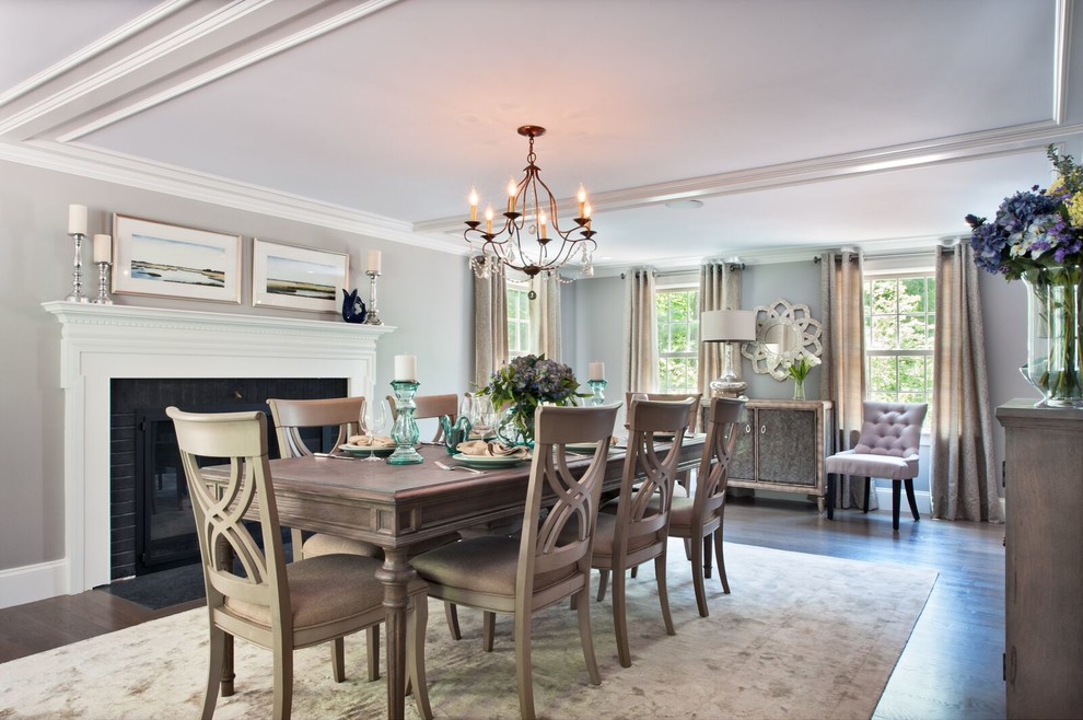 Large transitional separate dining room in Boston with beige walls, dark hardwood floors, a standard fireplace and a brick fireplace surround.