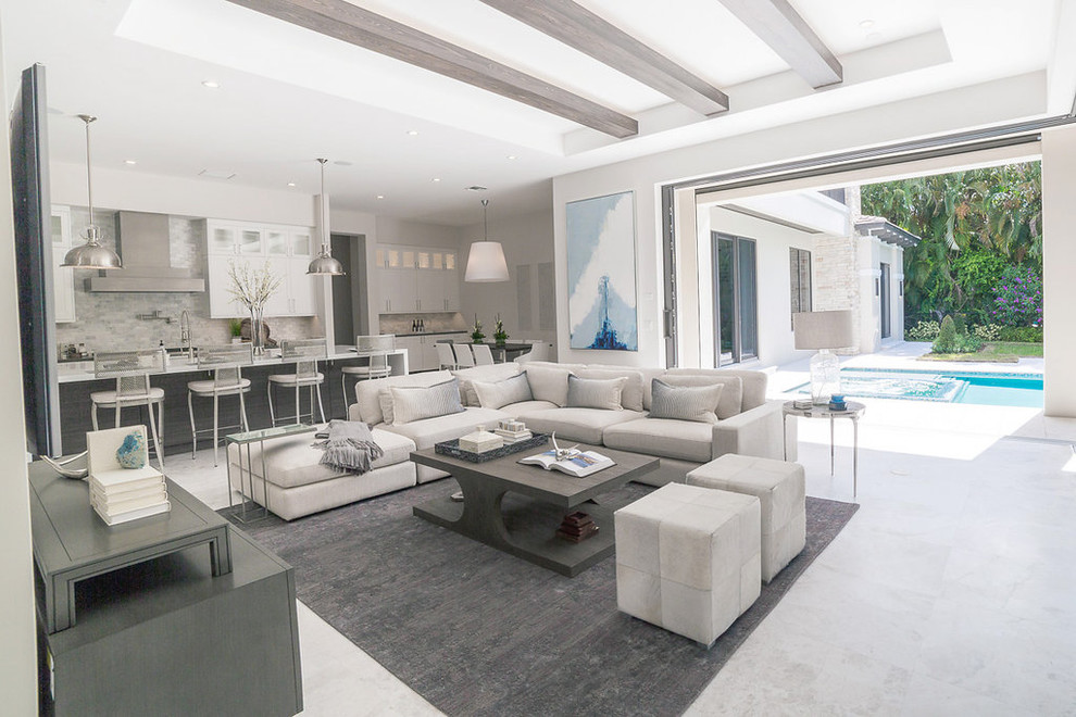 Inspiration for a large contemporary open concept living room in Miami with white walls, porcelain floors, no fireplace, no tv and grey floor.