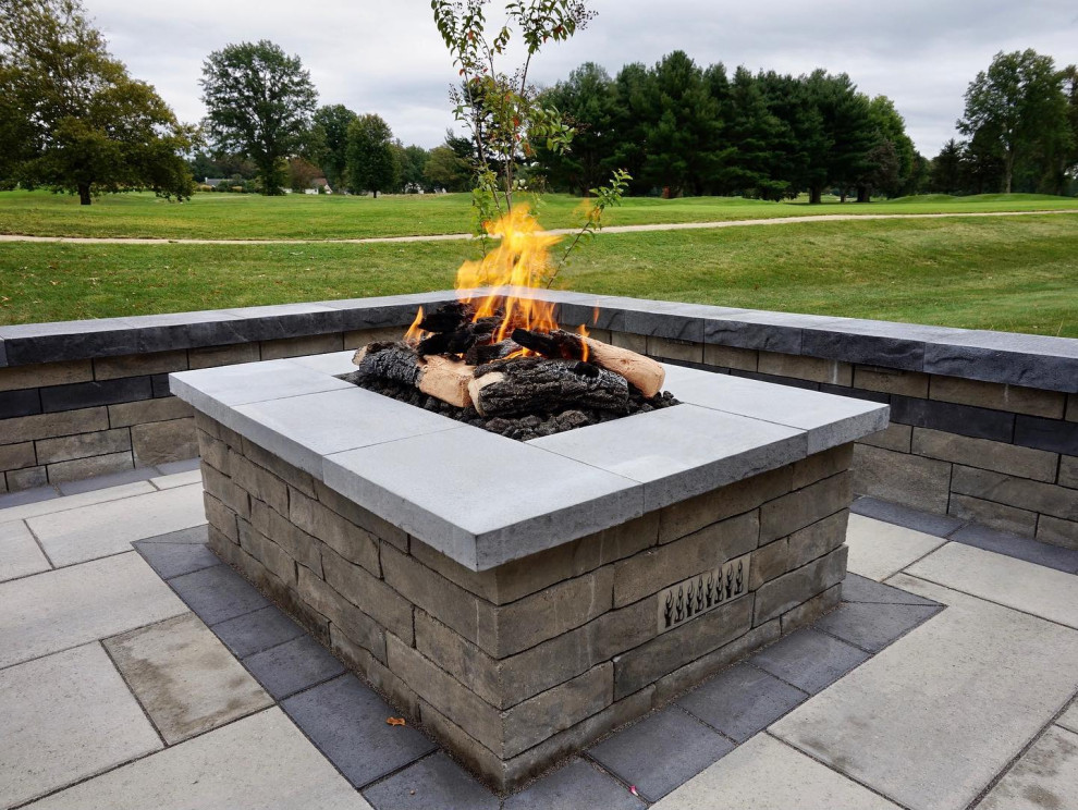 Manalapan, NJ: Contemporary Patio with Tranquil Water Feature & Firepit Area