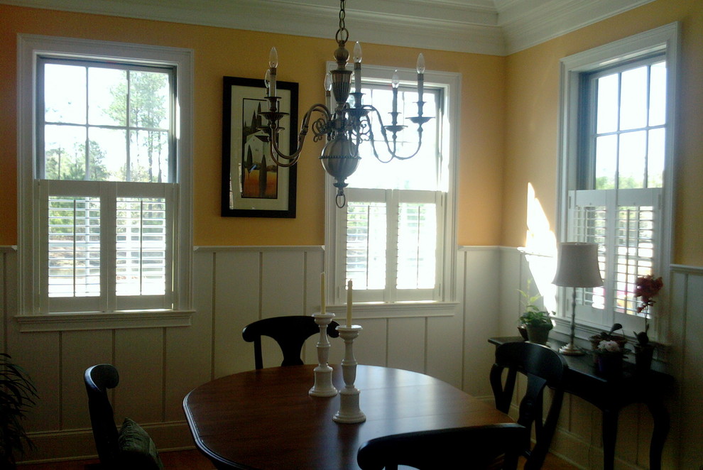This is an example of an eclectic dining room in Wilmington.