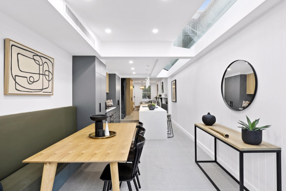 Photo of a small contemporary kitchen in Sydney with ceramic floors and grey floor.