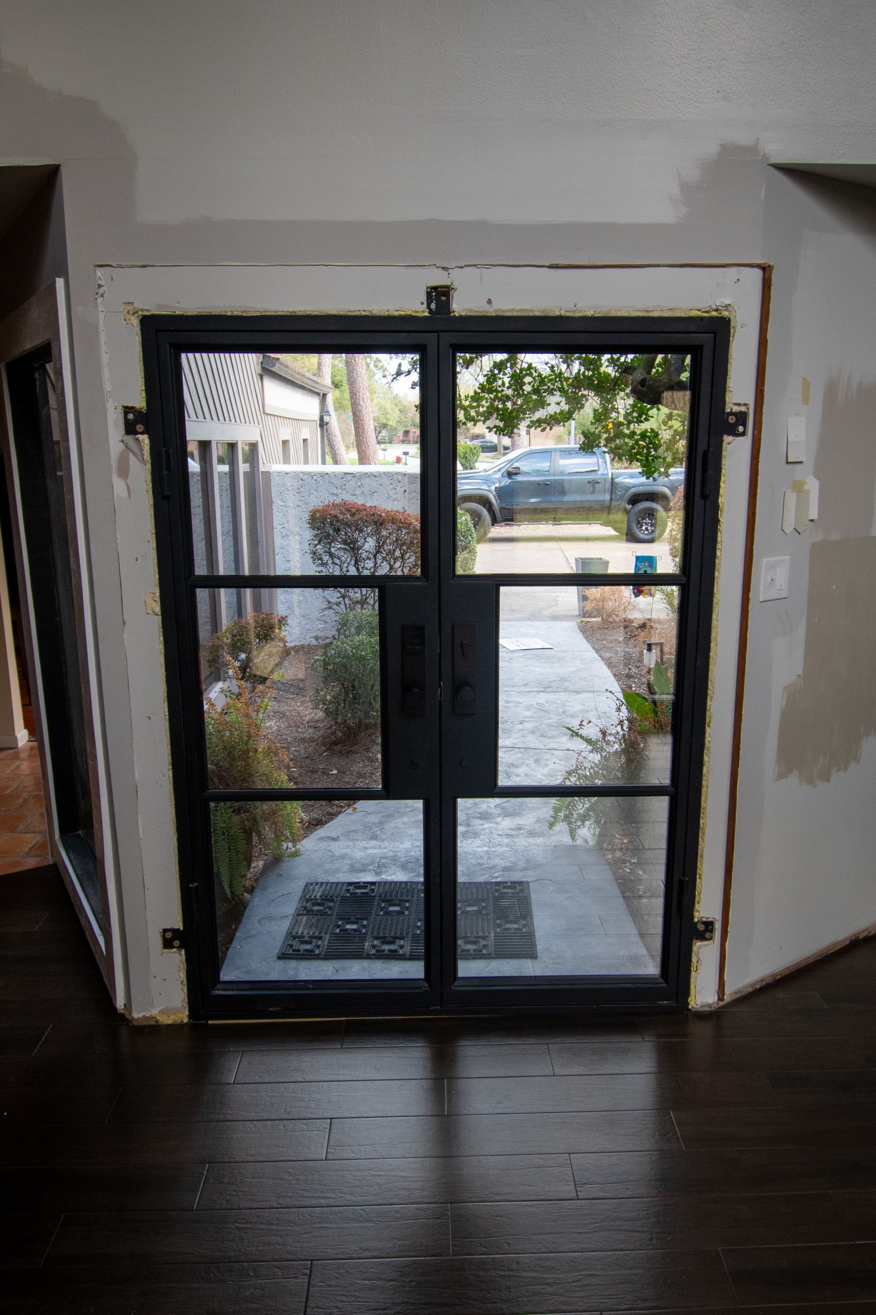 Contemporary Entry Makeover: Iron Door Installation in Tomball & Cypress