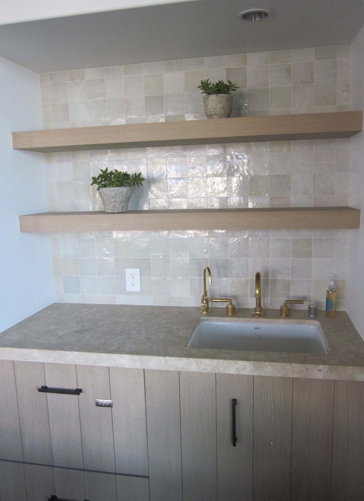 Example of a transitional home design design in Orange County