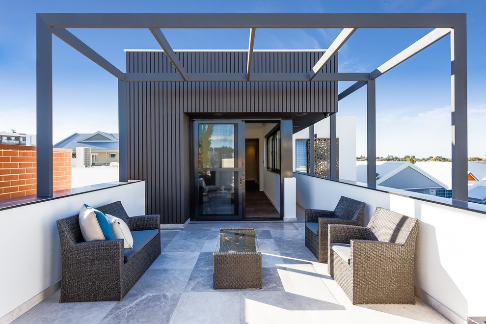 Photo of a contemporary rooftop and rooftop deck in Perth with a pergola.