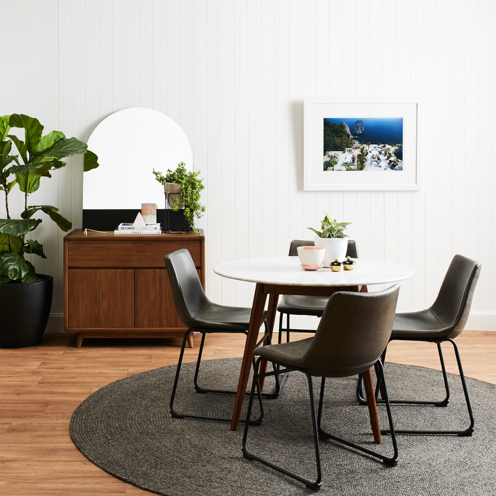 Design ideas for a mid-sized modern dining room in Sydney with white walls, vinyl floors, no fireplace and beige floor.