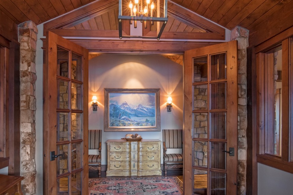 Mountain style home design photo in Denver