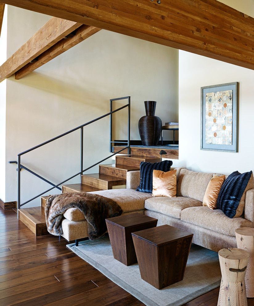 Living room - huge transitional open concept dark wood floor and brown floor living room idea with white walls, a standard fireplace, a plaster fireplace and no tv