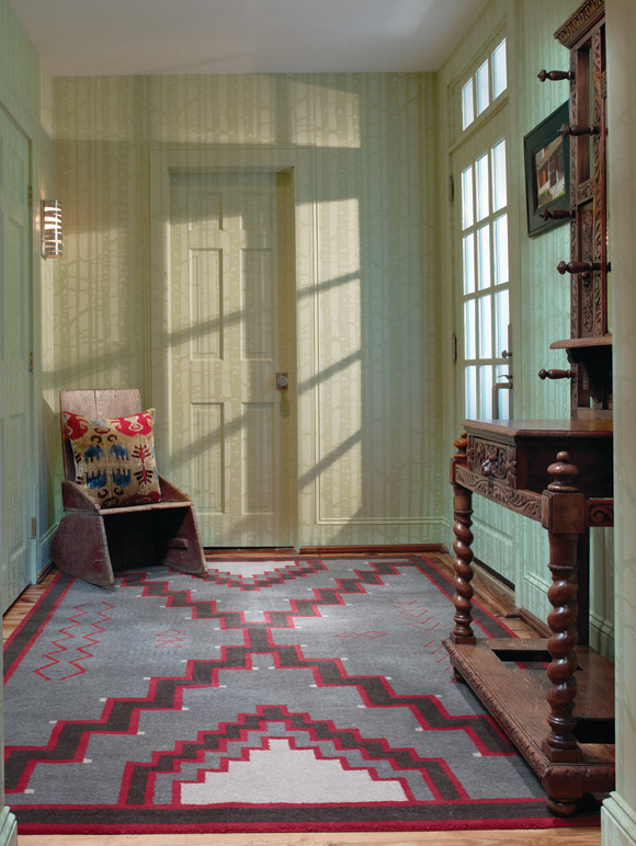 Photo of a contemporary entryway in Wilmington with medium hardwood floors.