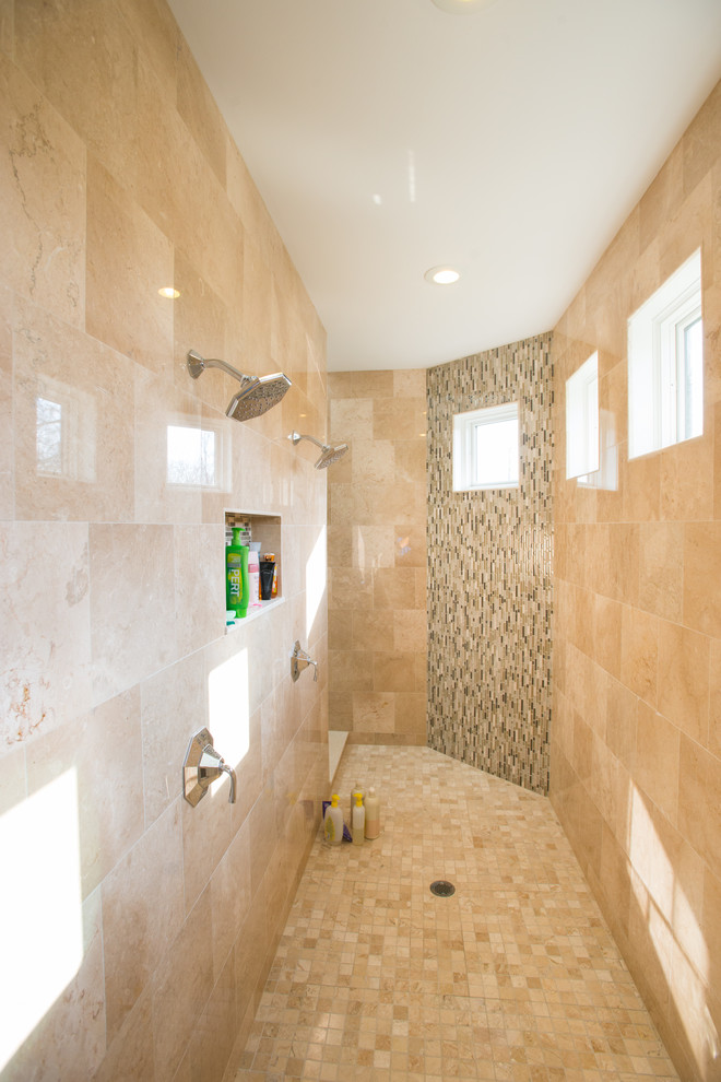 This is an example of a large transitional master bathroom in Other with dark wood cabinets, a drop-in tub, a double shower, beige tile, gray tile, white tile, matchstick tile, beige walls, limestone floors, an undermount sink, beige floor and an open shower.