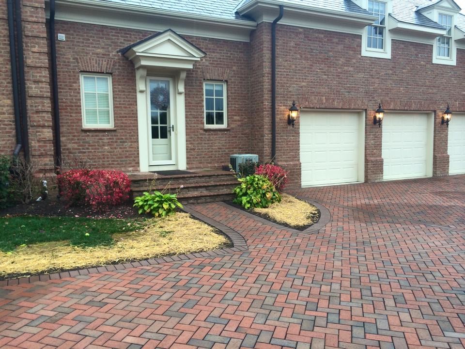 Small brick floor single front door photo in Columbus