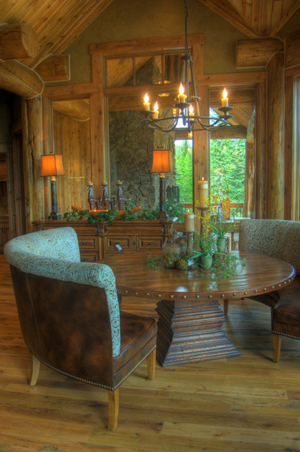 Inspiration for a country dining room in Other with light hardwood floors and beige floor.