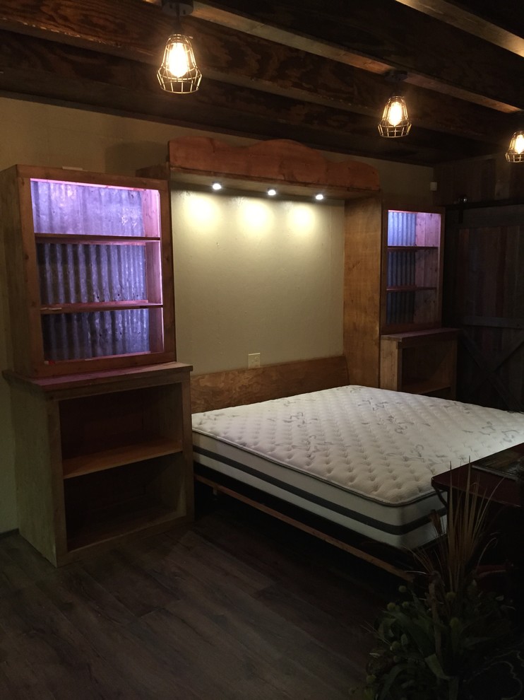 Example of a transitional bedroom design in Austin