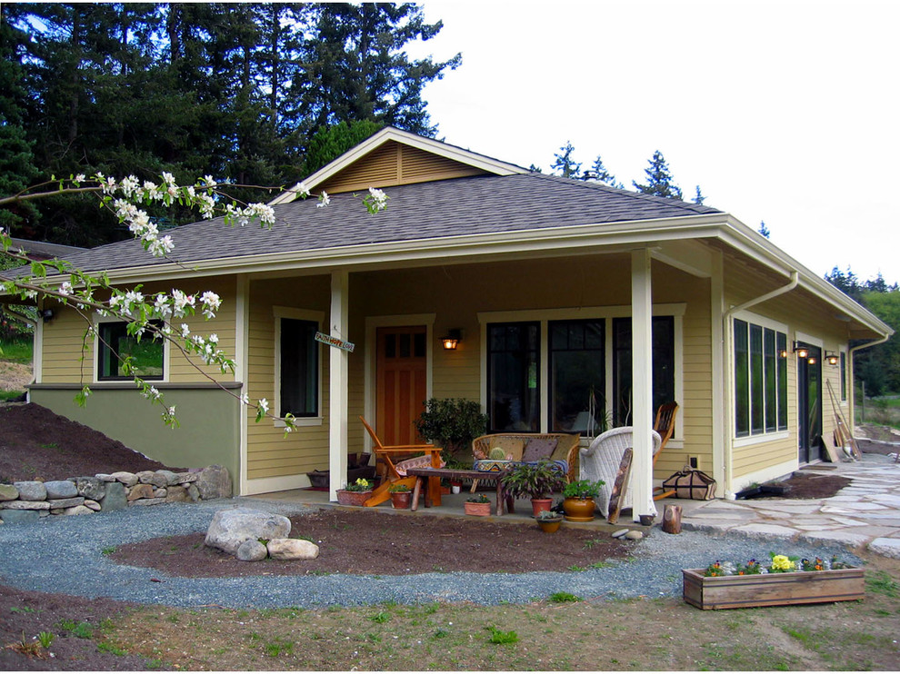 Home design - small cottage home design idea in Seattle