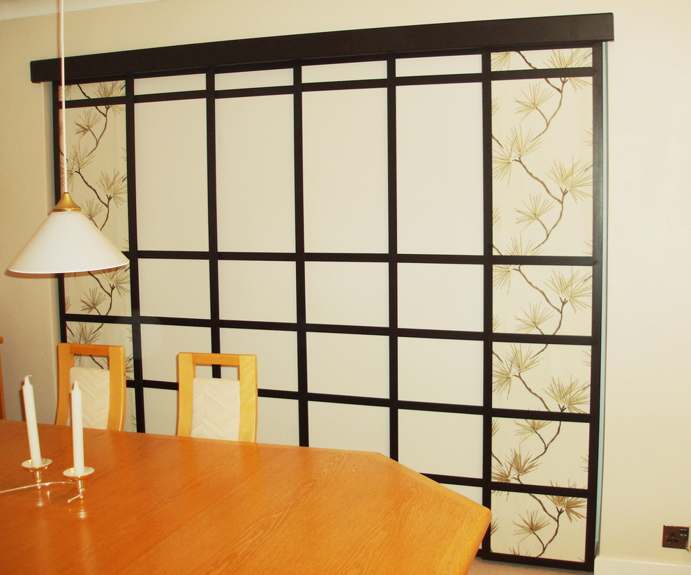 This is an example of an asian dining room in Other.