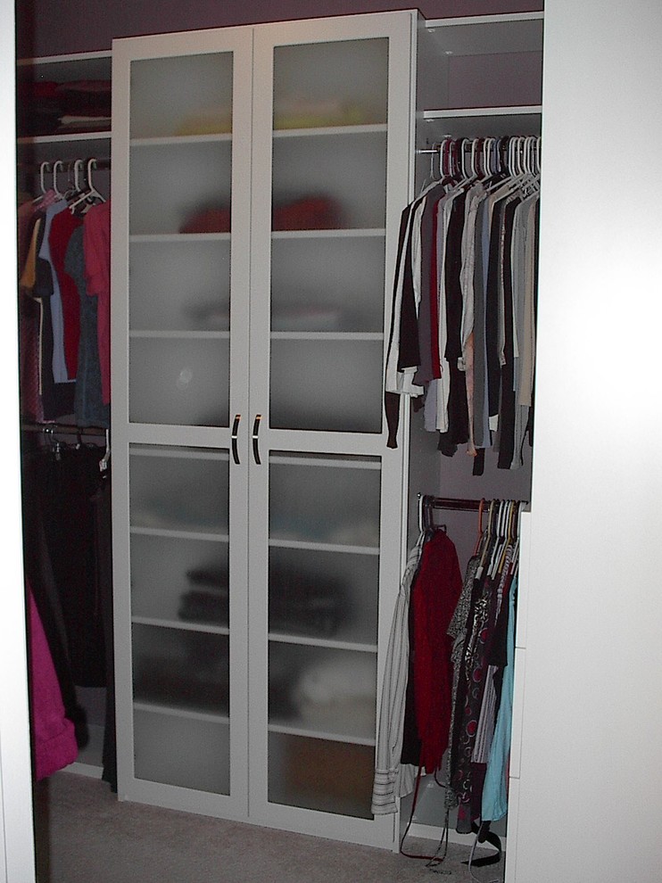 Photo of a contemporary storage and wardrobe in Cleveland.