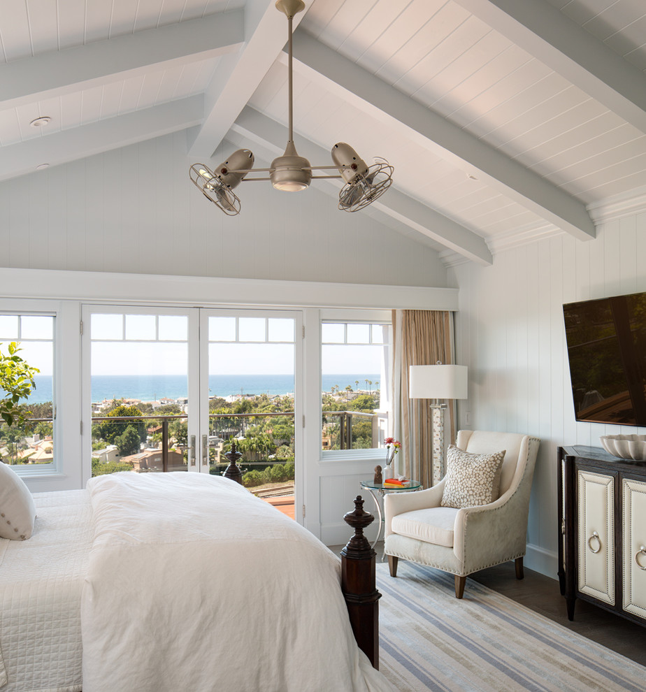 Design ideas for a mid-sized transitional master bedroom in San Diego with white walls, dark hardwood floors and no fireplace.