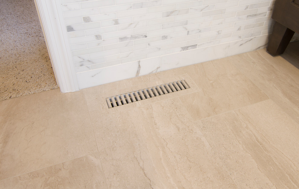 Example of a mid-sized transitional master gray tile porcelain tile home design design in Minneapolis with furniture-like cabinets, gray cabinets, an undermount tub, a bidet, gray walls, an undermount sink and quartzite countertops