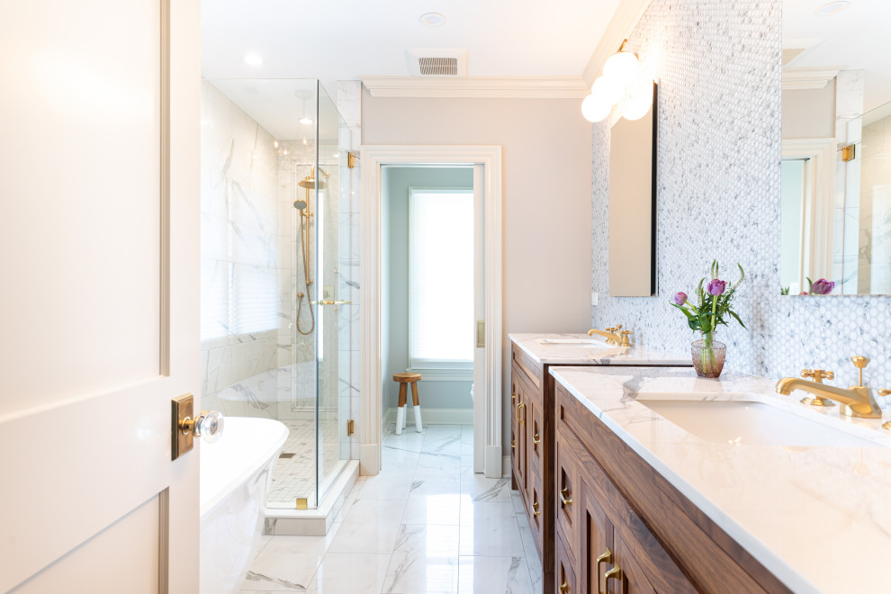 Luxury Bathroom Featuring Freestanding Bathtub and Wooden Vanity with Elegant Fi