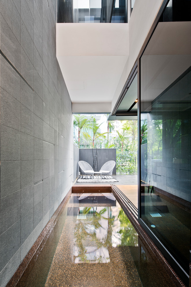 Photo of a contemporary pool in Singapore.