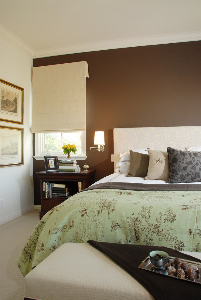 Photo of a traditional bedroom in Los Angeles with brown walls.
