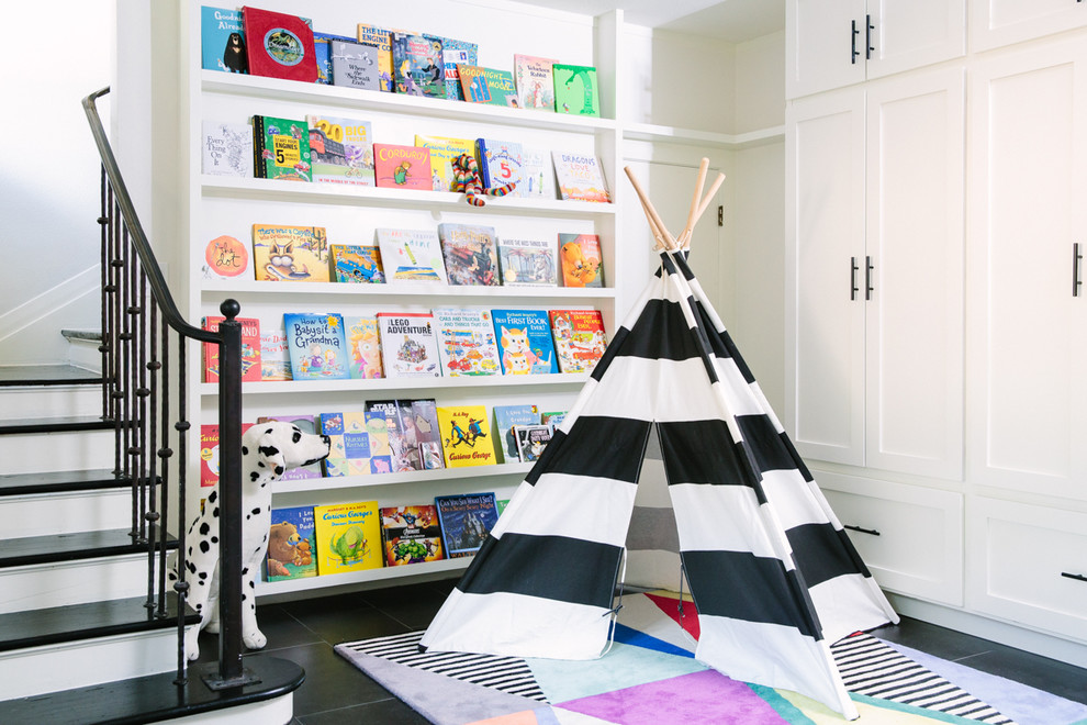 Southill - Incorporating a black and white tent with colorful books makes for a fun spot to sit and read.