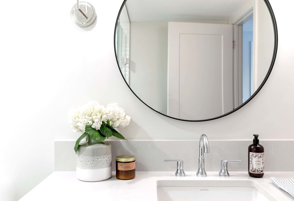 Example of a mid-sized transitional 3/4 white tile and ceramic tile porcelain tile and gray floor doorless shower design in Calgary with shaker cabinets, gray cabinets, white walls, an undermount sink, quartzite countertops, a hinged shower door and white countertops
