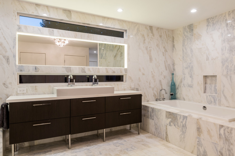 This is an example of a large contemporary master bathroom in San Francisco with dark wood cabinets.