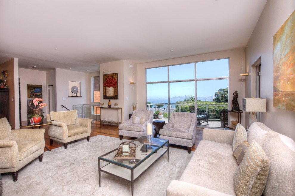 This is an example of a large contemporary formal enclosed living room in San Francisco with medium hardwood floors.