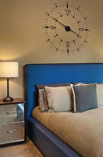 Inspiration for a mid-sized transitional carpeted and beige floor bedroom remodel in Seattle with brown walls