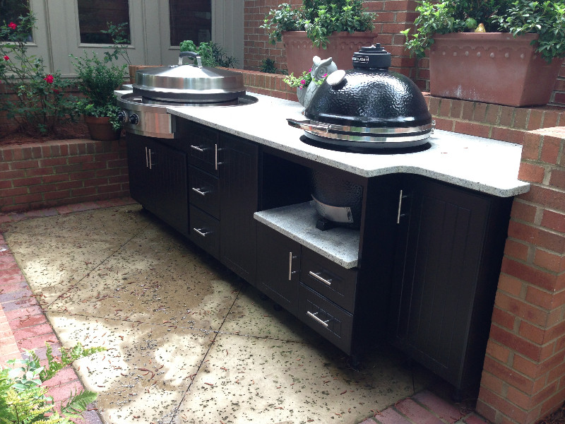 Mid-sized transitional backyard patio in Atlanta with an outdoor kitchen, concrete pavers and no cover.